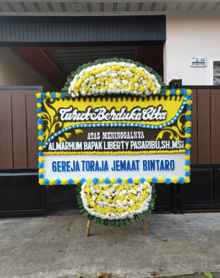 Papan Bunga Duka di Urei Faisei